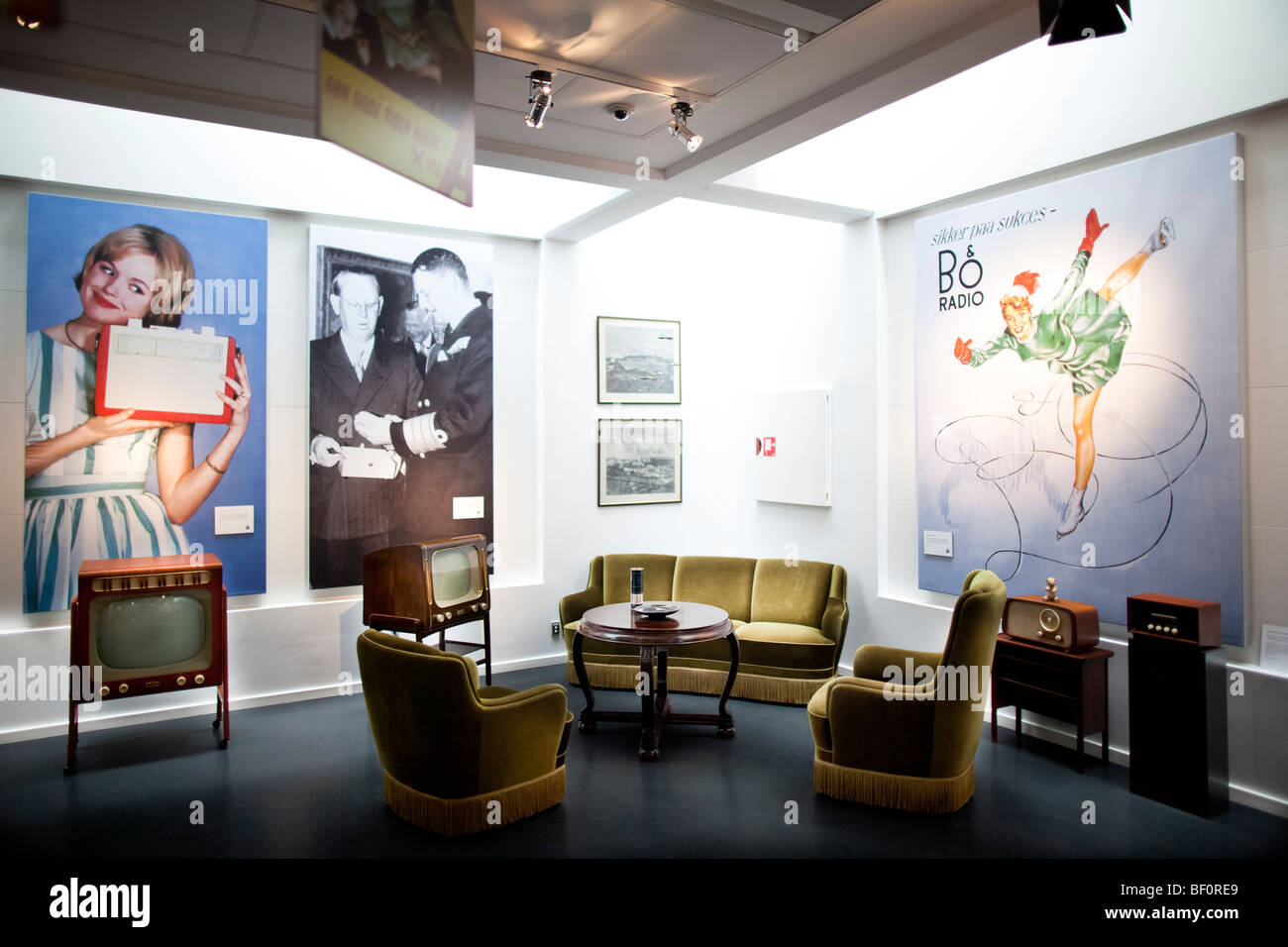 Historical televisions are seen in a recreated room furnishings in the