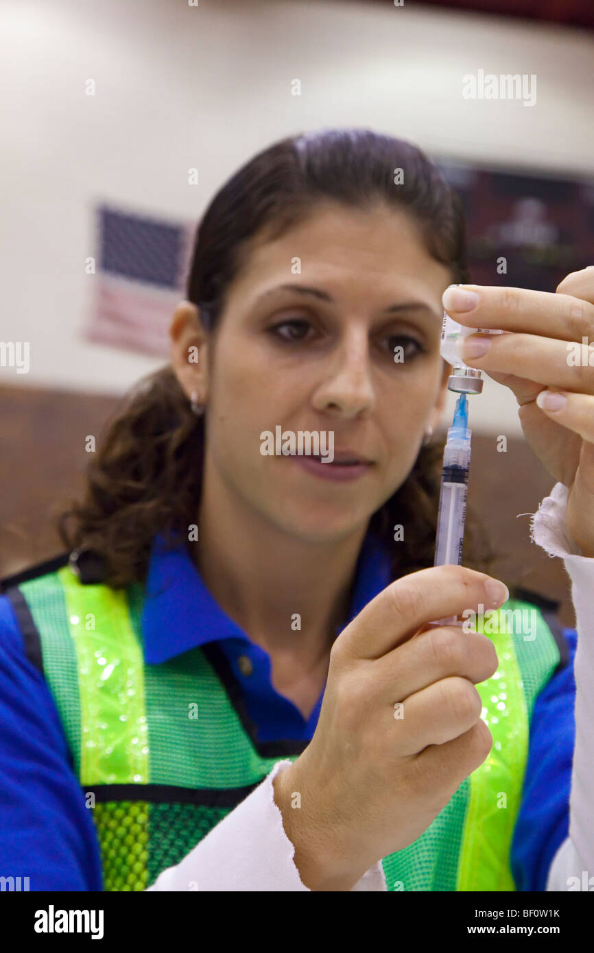 Hamtramck, Michigan - A health care worker prepares to administer a dose of the H1N1 swine flu vaccine. Stock Photo