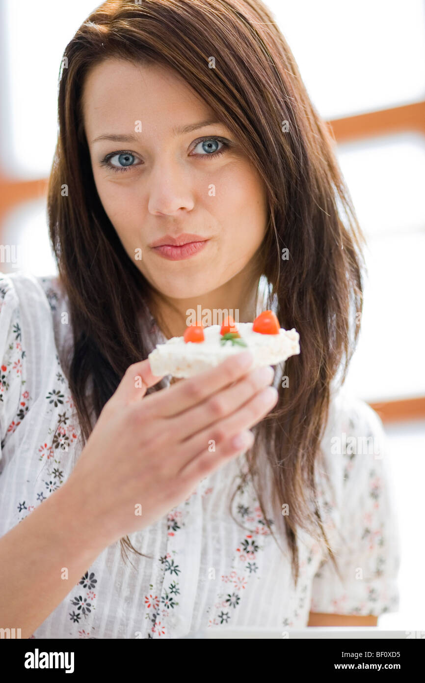 Attractive Woman Eating Cake High Resolution Stock Photography and