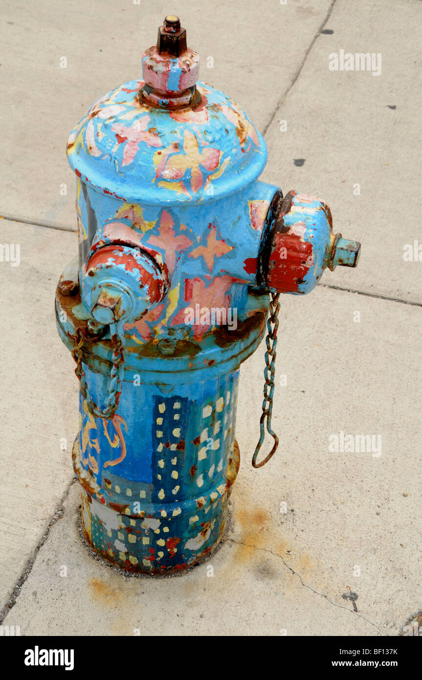 multicolored painted  fire hydrant  in Anne Arbor, Michigan Stock Photo