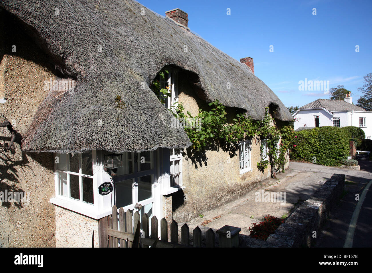 A picture perfect cottage in the Dorset seaside village of Studland on the Isle of Purbeck Stock Photo