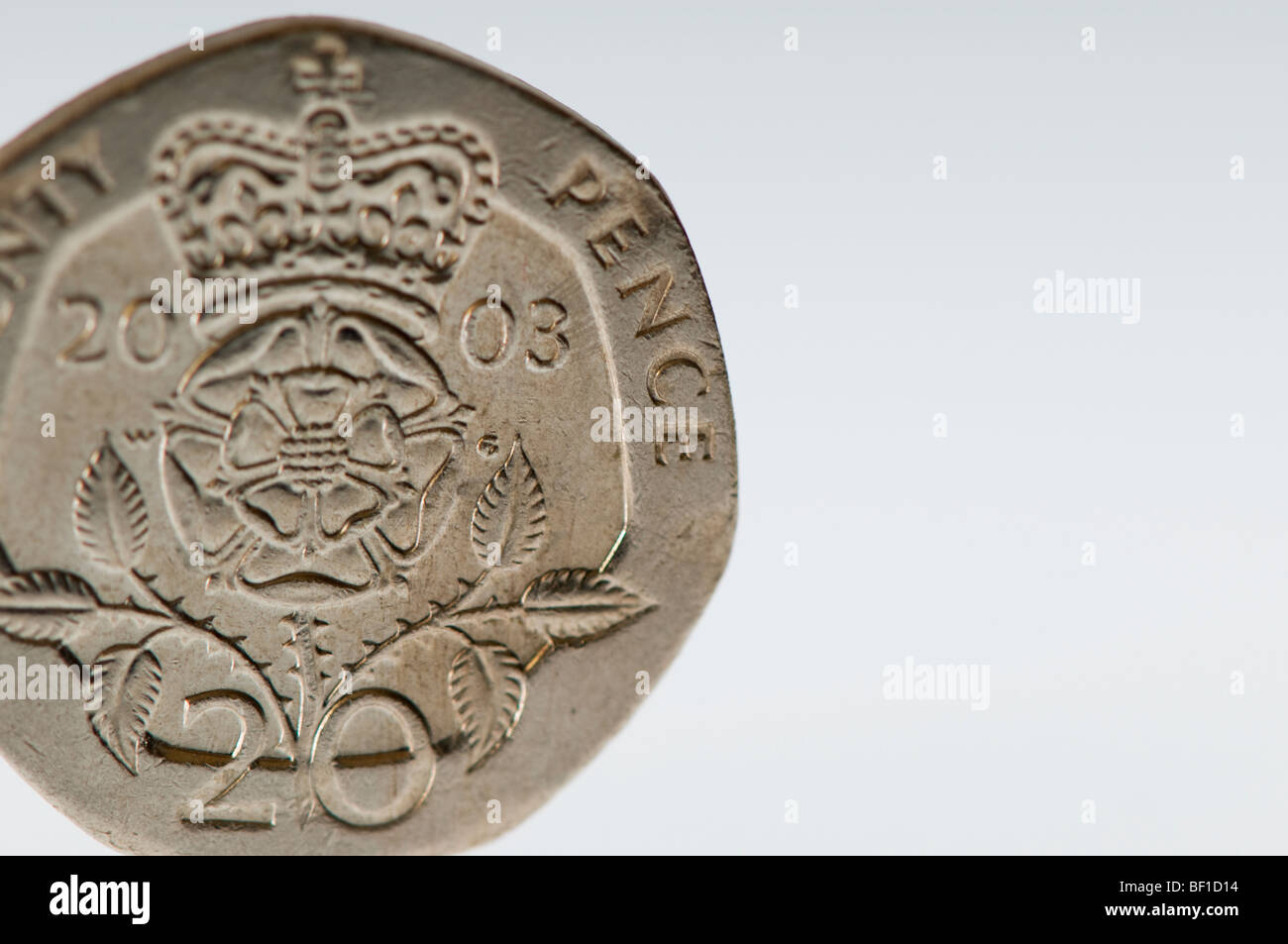 Close up shot of  20 pence coins, shot against white. Stock Photo