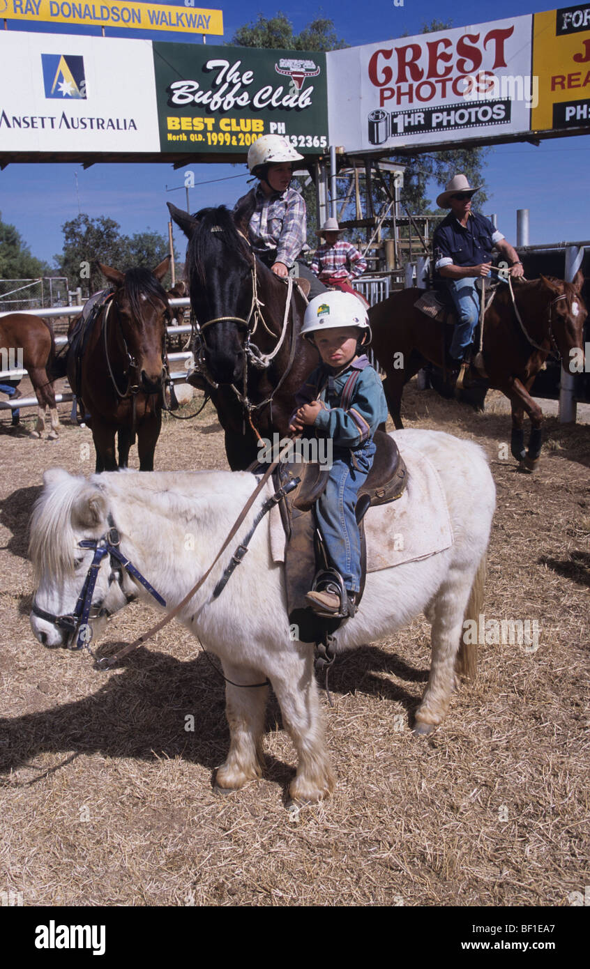 Young boys riding ponies and horses, rodeo, Queensland Australia Stock Photo