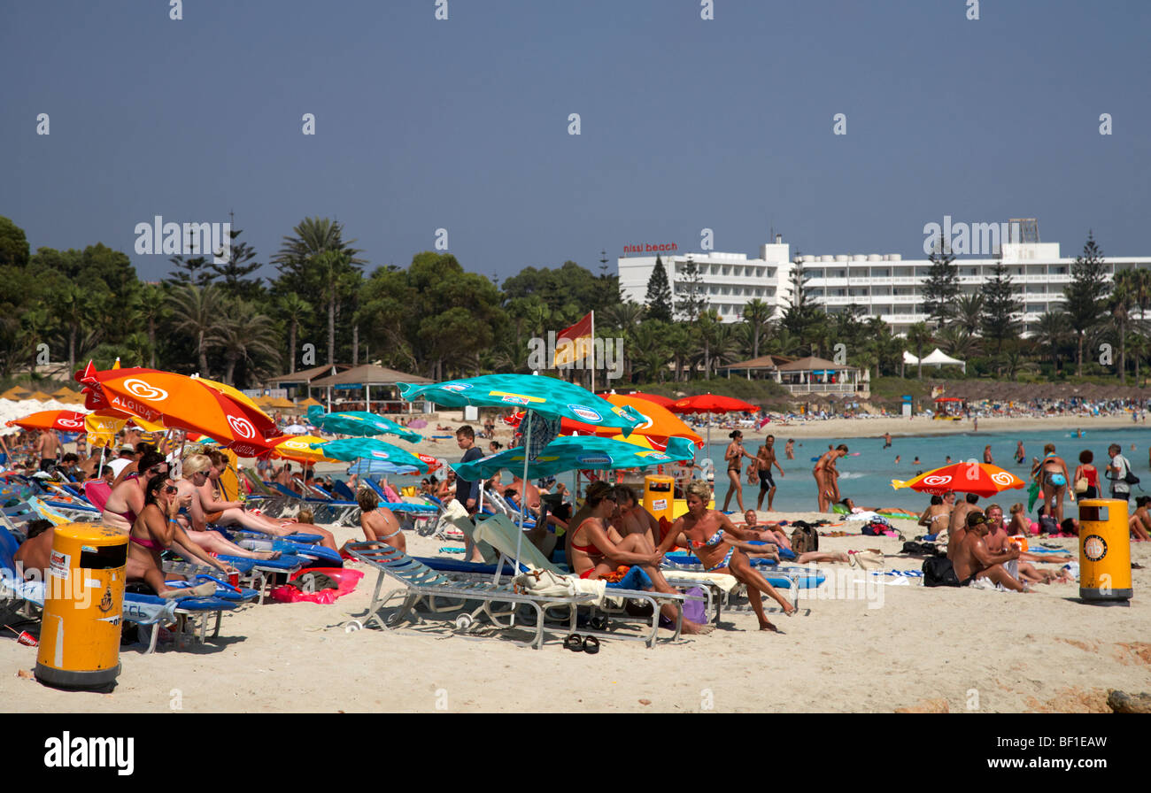 nissi beach crowded with tourists ayia napa republic of cyprus europe Stock Photo