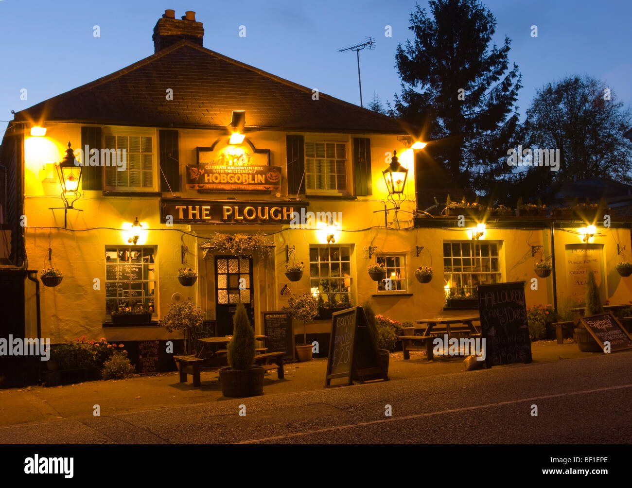 The Plough Public House Redhill Surrey Illuminated At Dusk Stock Photo