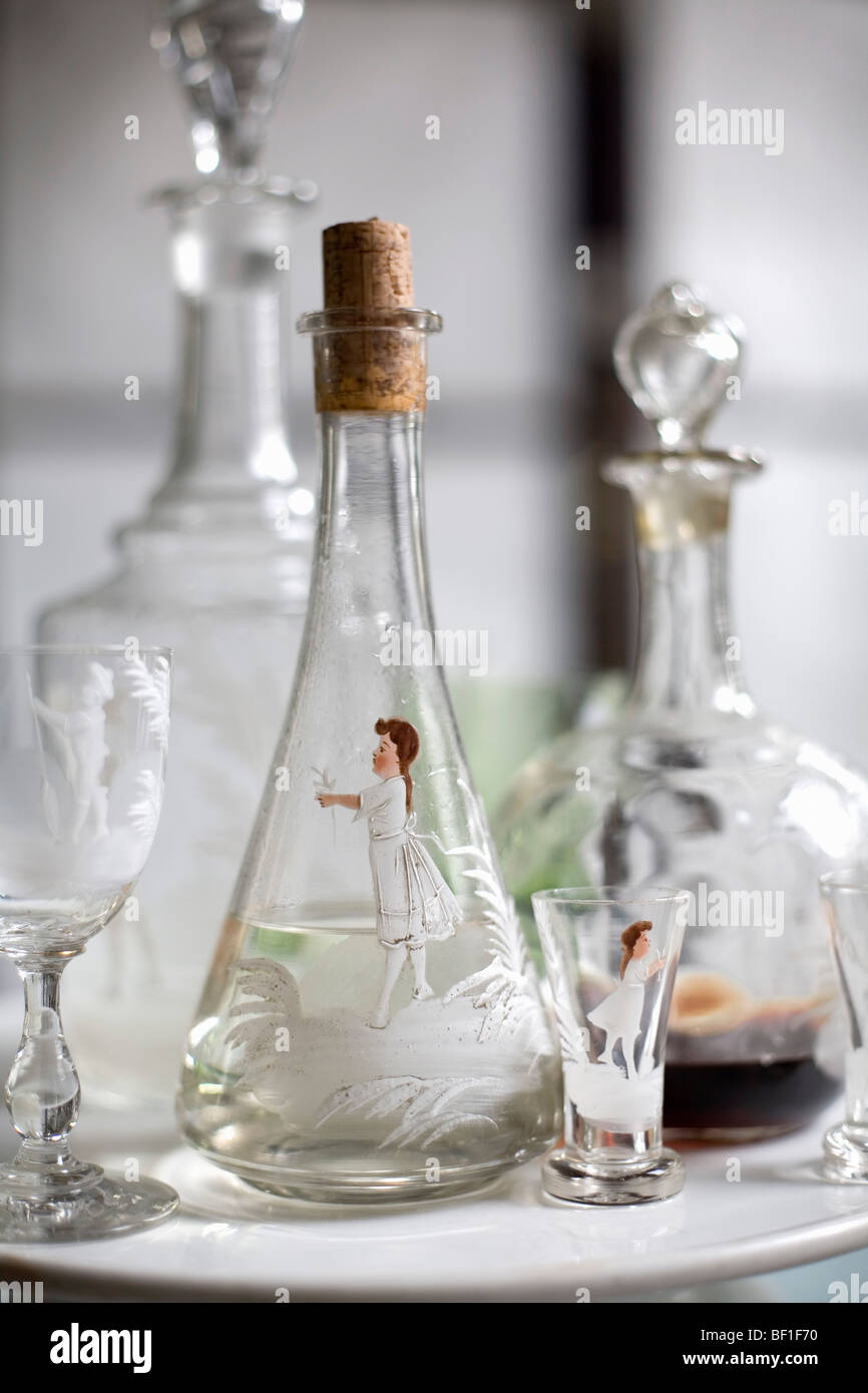 Various decanters and glasses Stock Photo