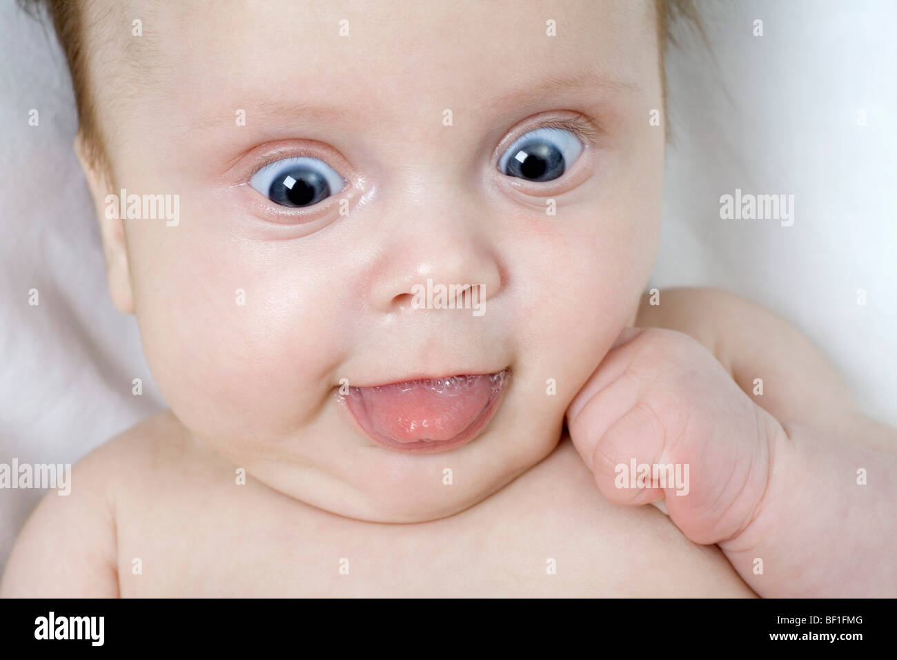 Baby pulling funny face hi-res stock photography and images - Alamy