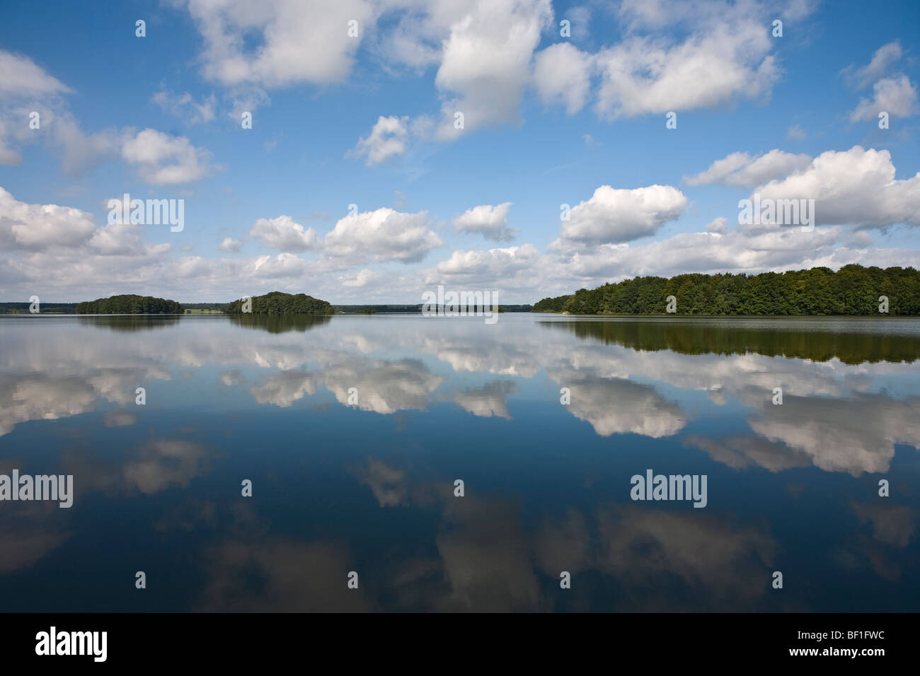 Clouds reflected on the surface of a lake, Sweden. Stock Photo