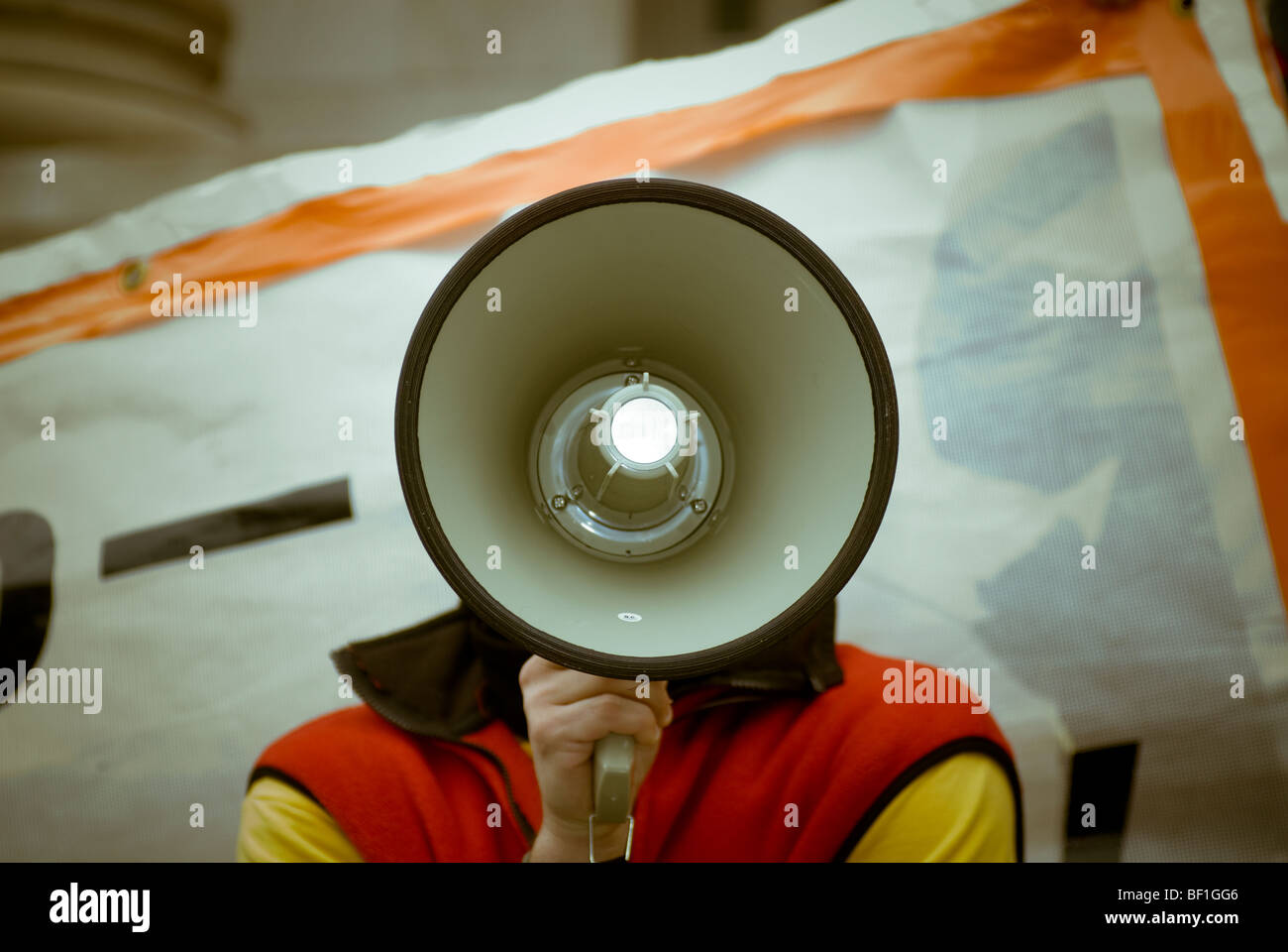 Speaking into a megaphone Stock Photo Alamy