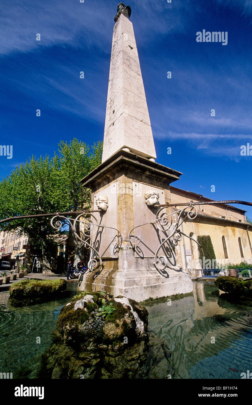 The fountain in the square of the Provence village of Aups Stock Photo