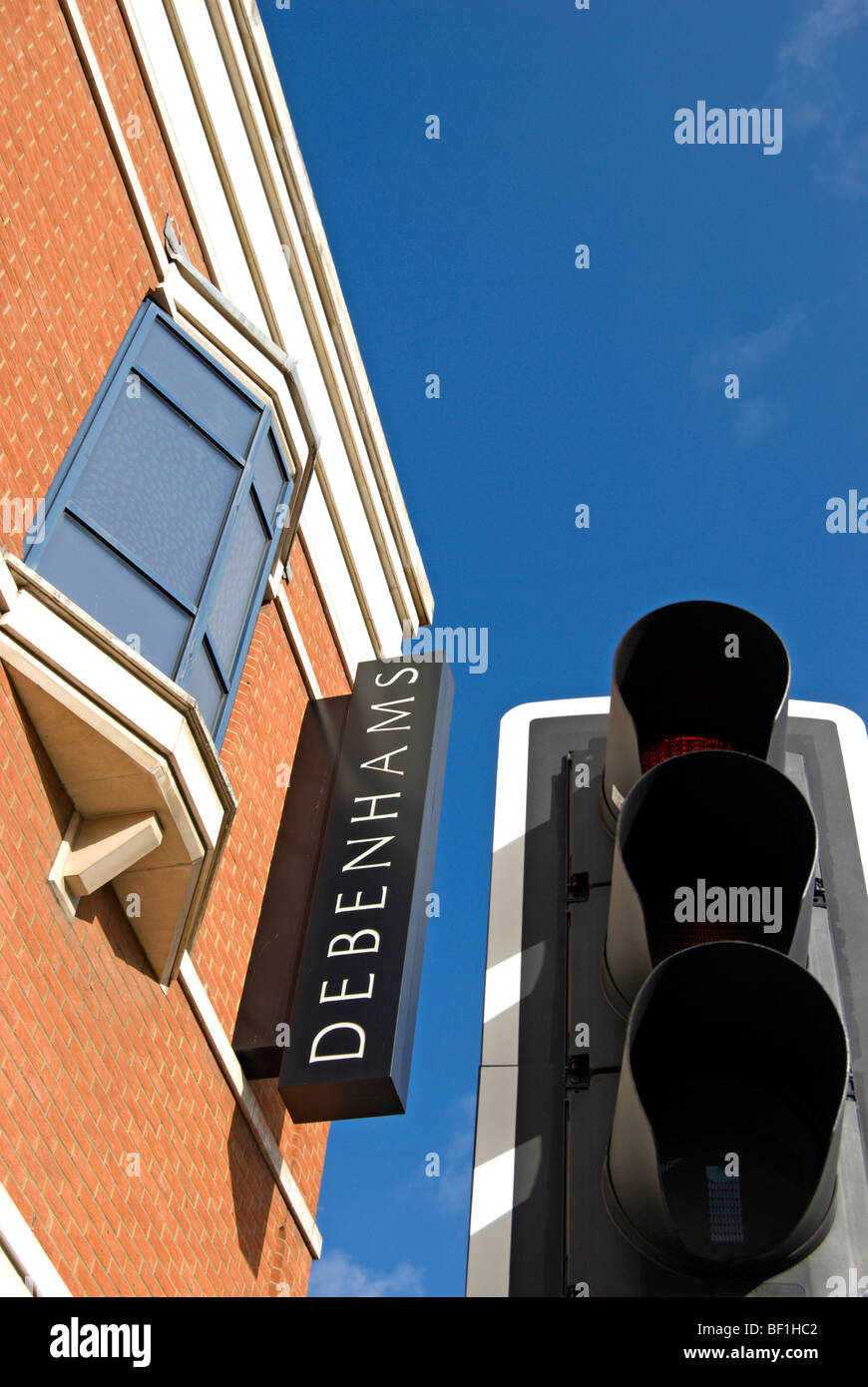 sign for branch of debenhams department store in wimbledon, southwest
