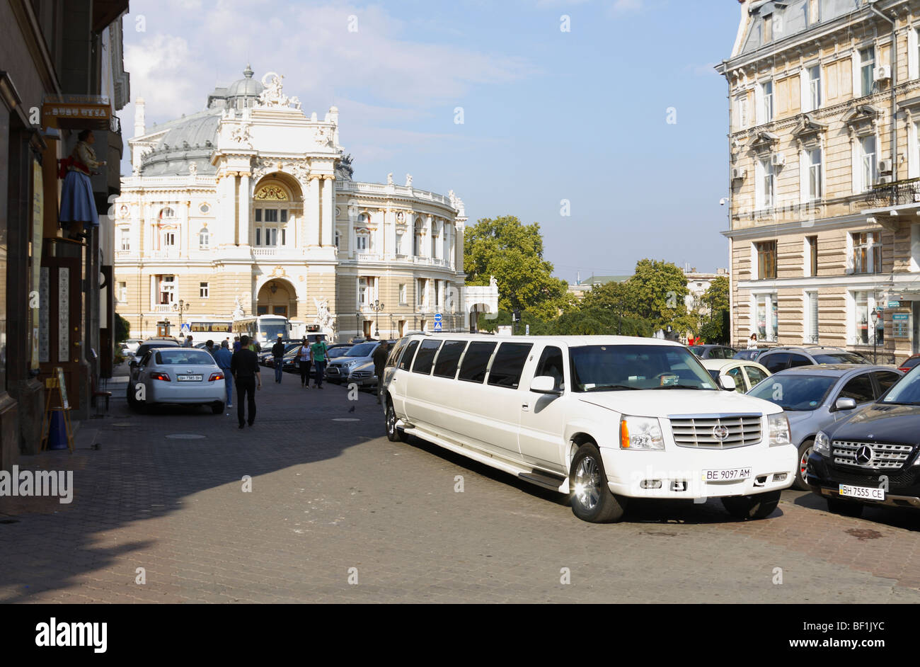 White limousine parked front of The Opera House (Building), Odessa, Ukraine, October 2009 Stock Photo