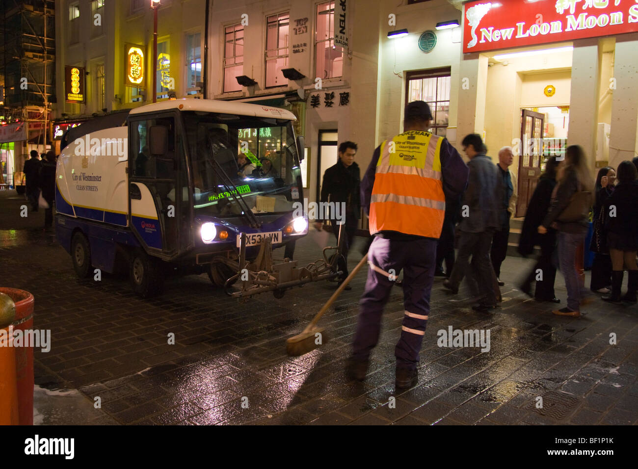 Westminster Street Cleaner in China Town Soho London Stock Photo
