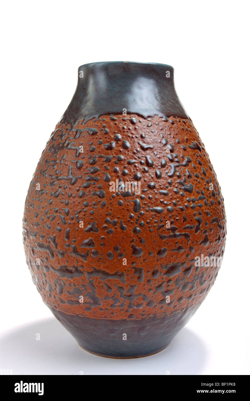 Vintage brown and grey retro seventies small vase isolated against ...