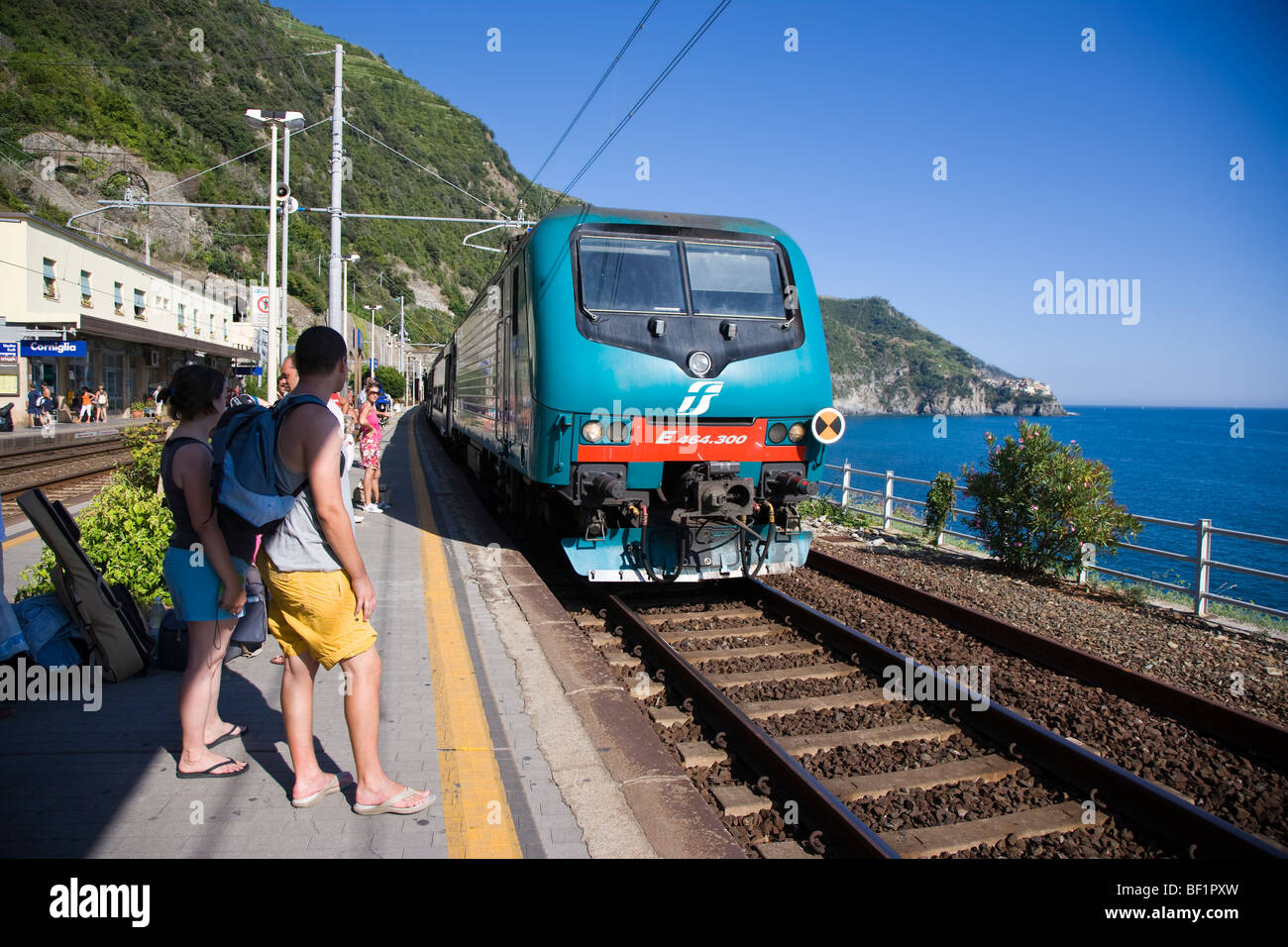 Train arriving at Manarola station, Cinque Terre, Liguria, Italy Stock Photo