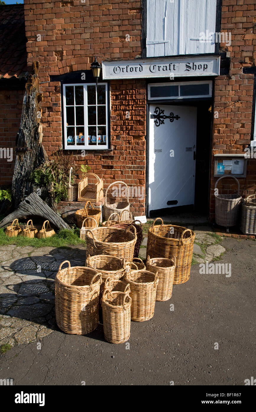 Wicker baskets outside craft shop, Orford, Suffolk, England Stock Photo