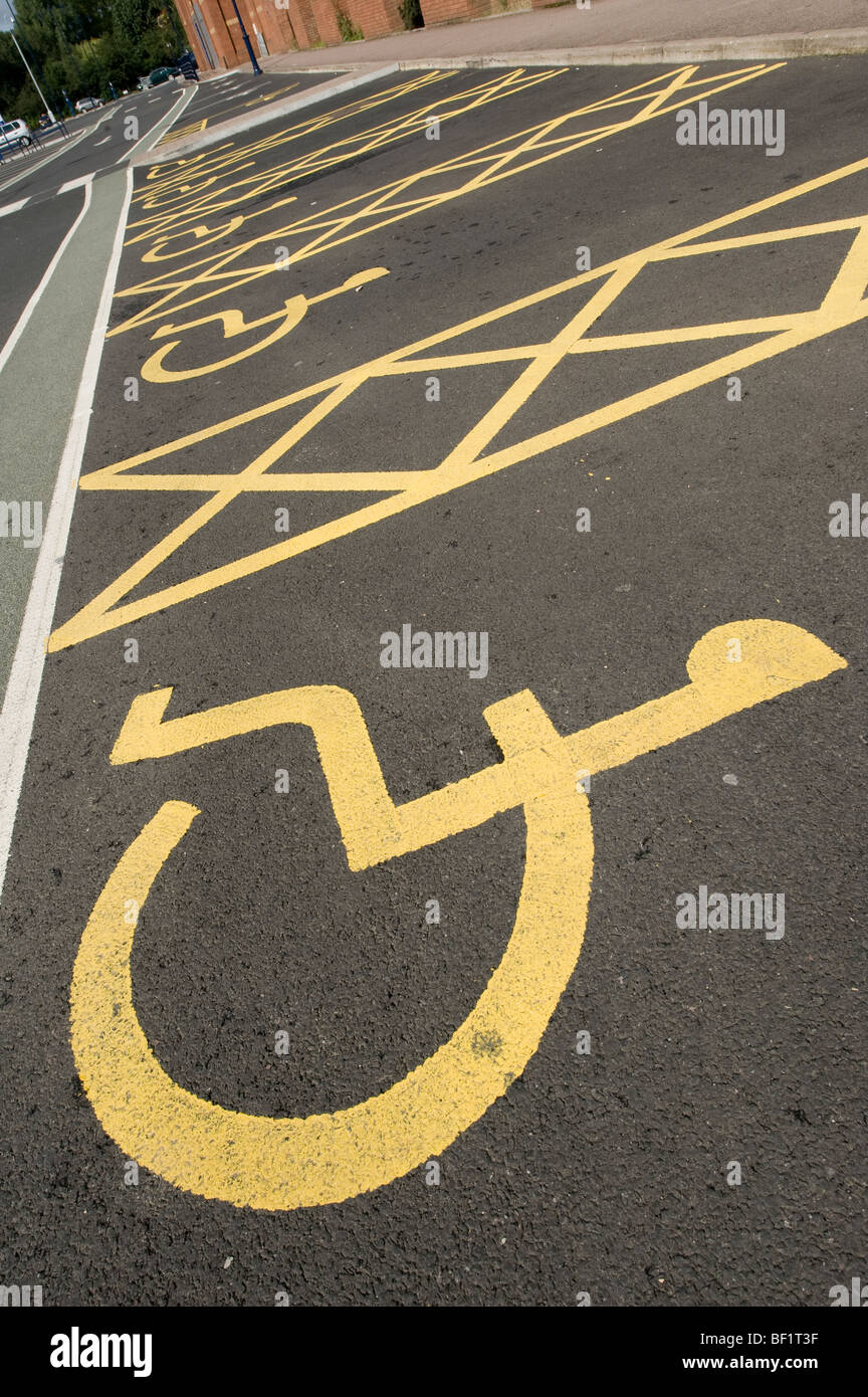 Car parking spaces reserved for disabled drivers in a car park in