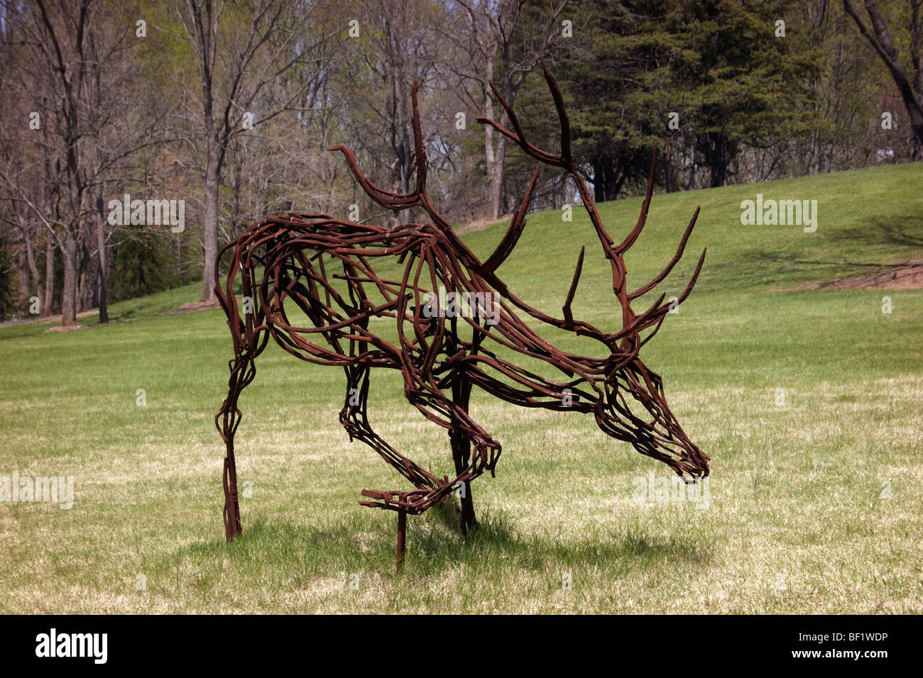 A metal sculpture of a moose on loan to Meadowlark Botanical Gardens
