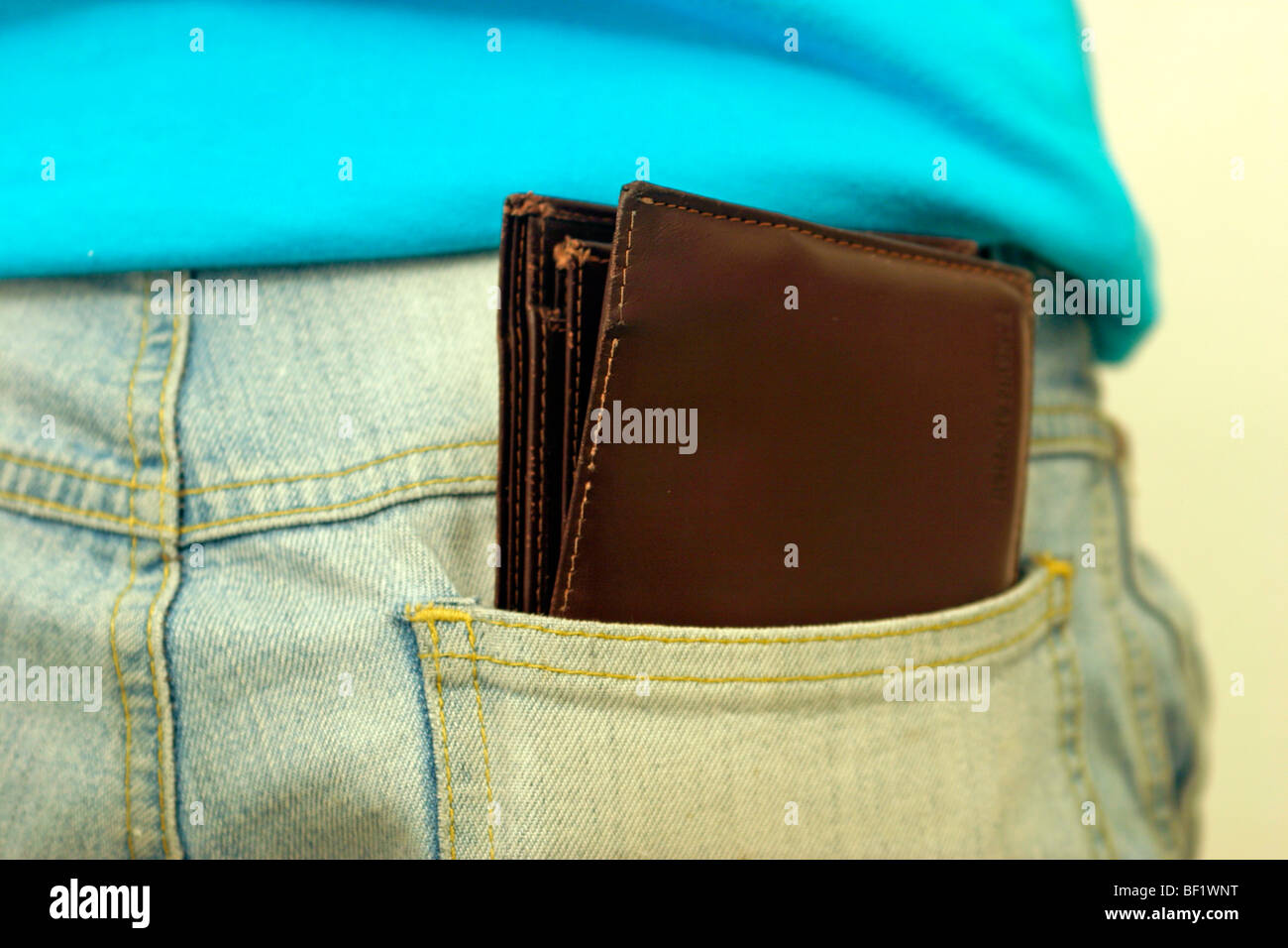 a wallet in someone´s back pocket Stock Photo Alamy