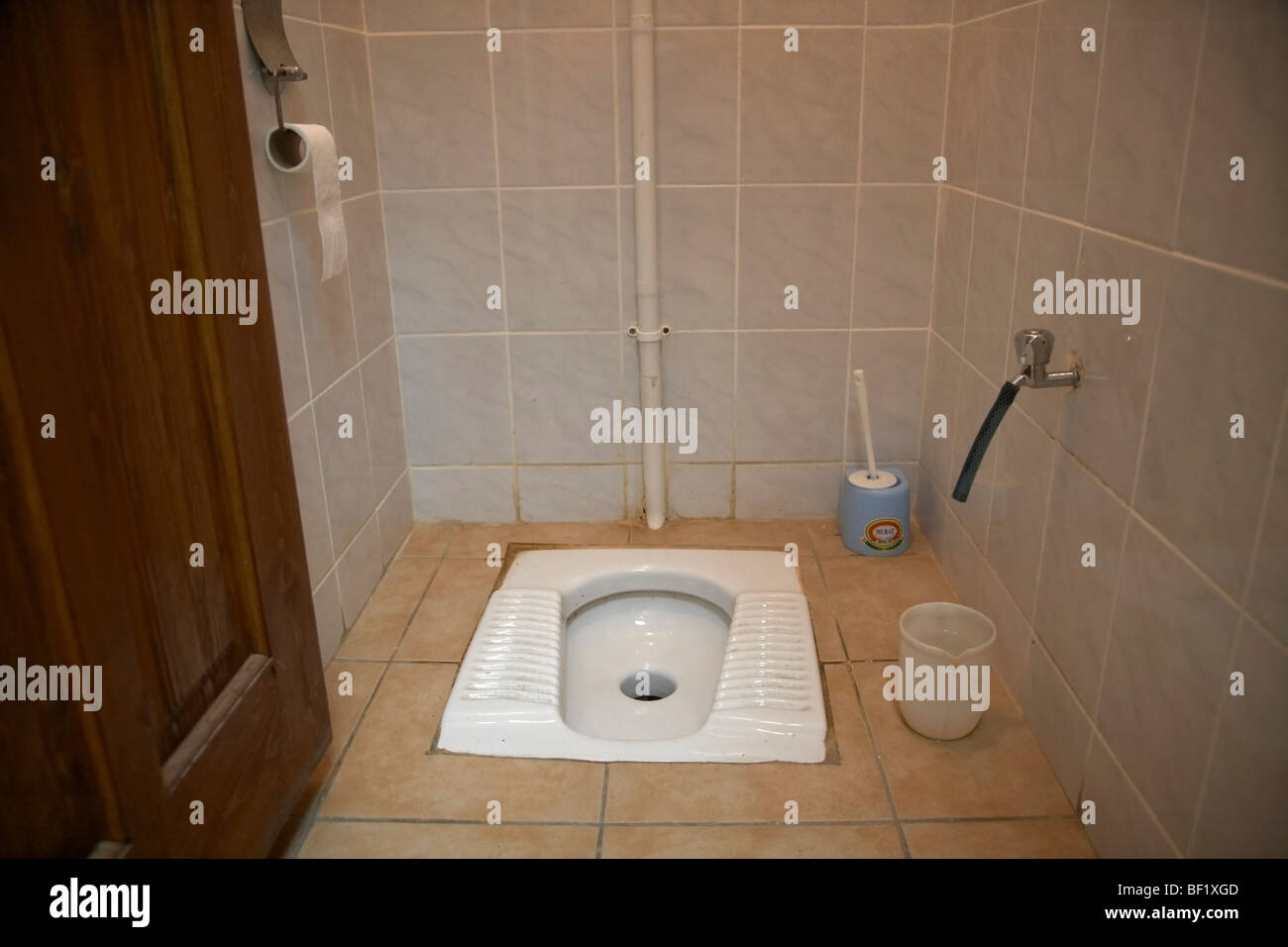 squat turkish toilet in bathroom in famagusta turkish republic of northern cyprus trnc Stock Photo