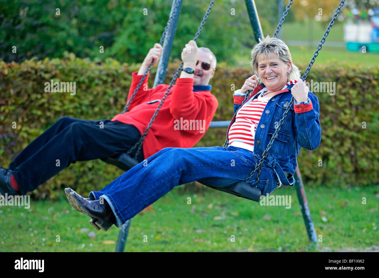 senior citizens playing on a playground together Stock Photo Alamy