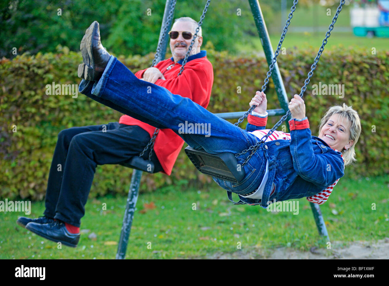 senior citizens playing on a playground together Stock Photo Alamy