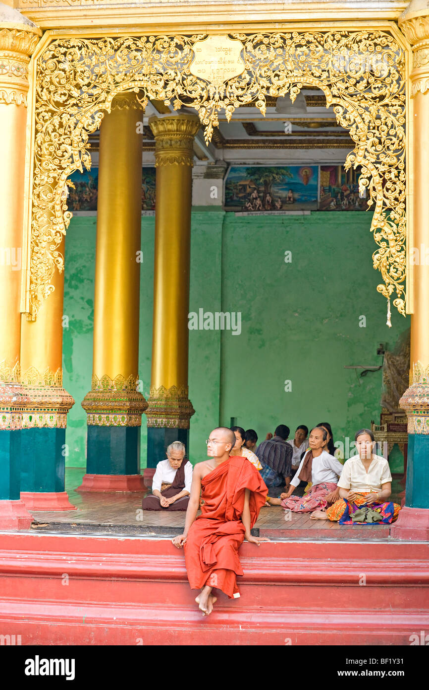 People praying at Shwedagon Paya, Yangoon, Myanmar. Stock Photo