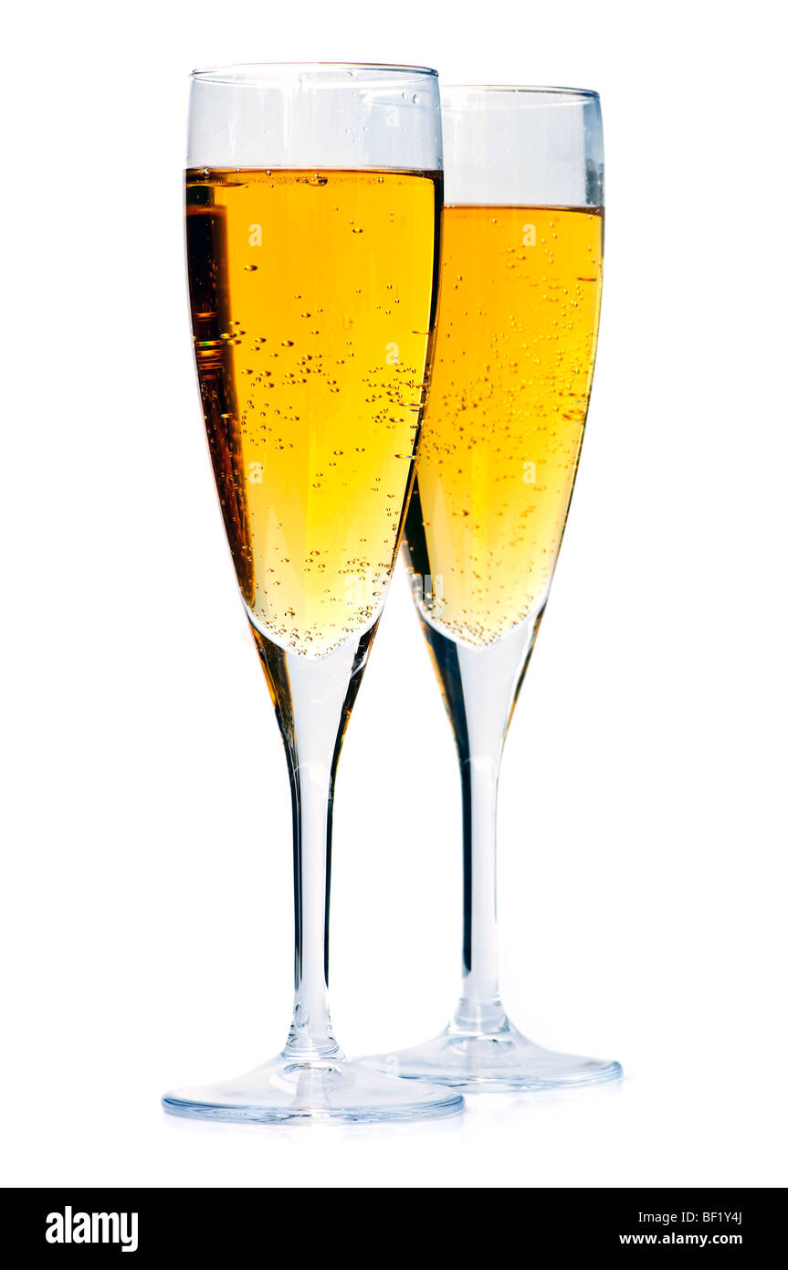 Two full champagne flutes isolated on white background Stock Photo