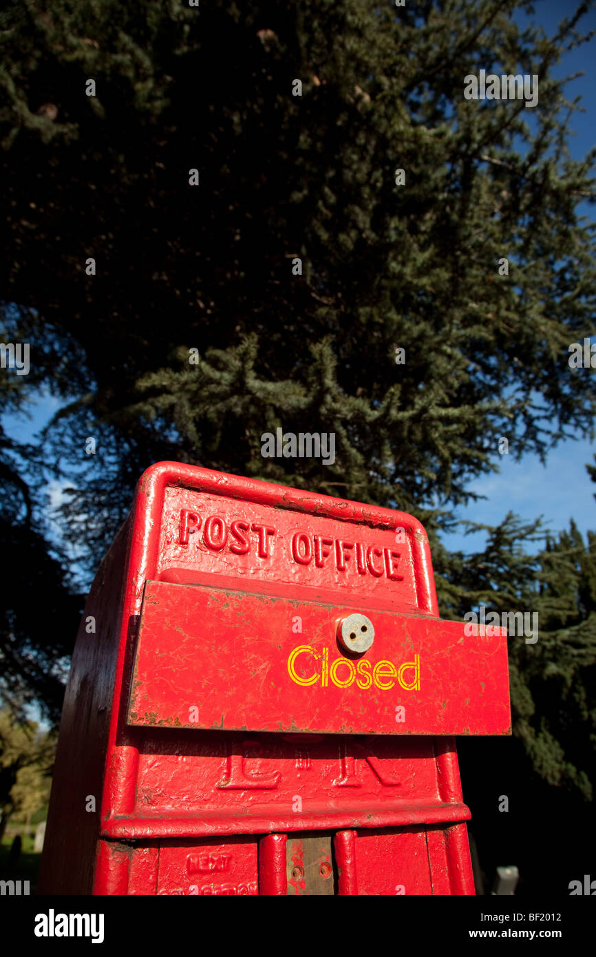 A photograph of a UK post box with closed sign Stock Photo