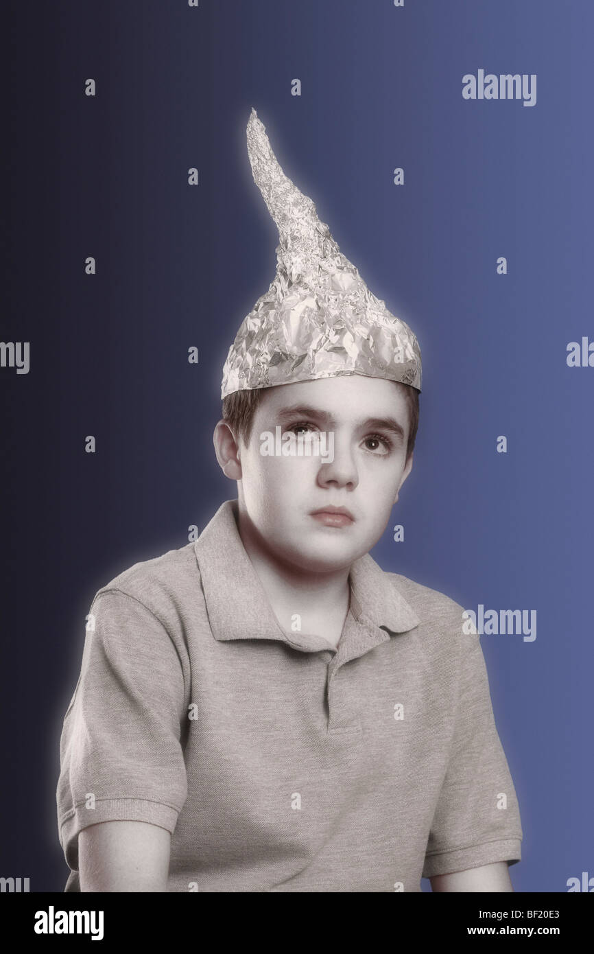 Boy wearing tin-foil hat. Stock Photo