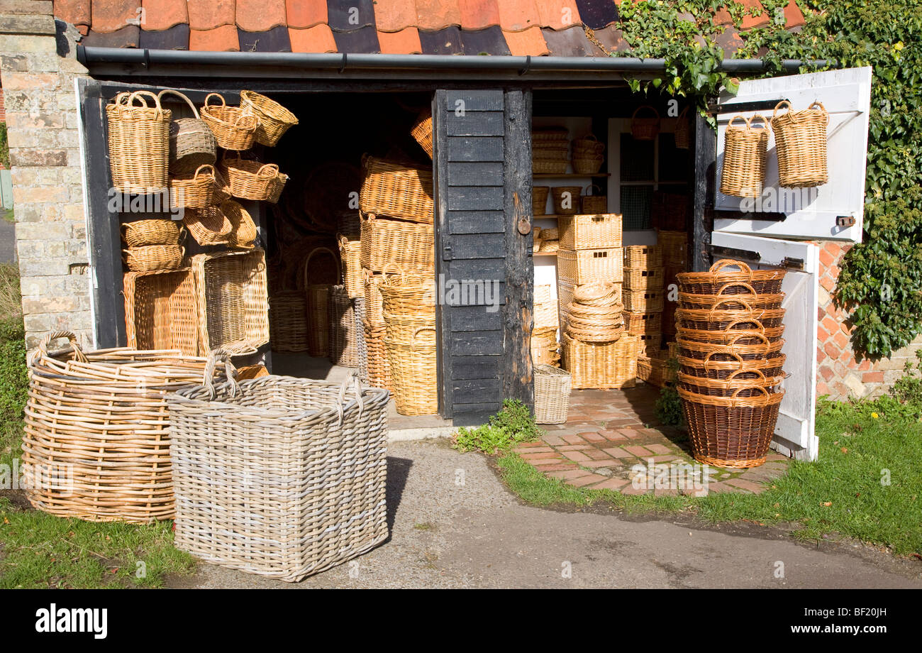 Wicker baskets outside craft shop, Orford, Suffolk, England Stock Photo