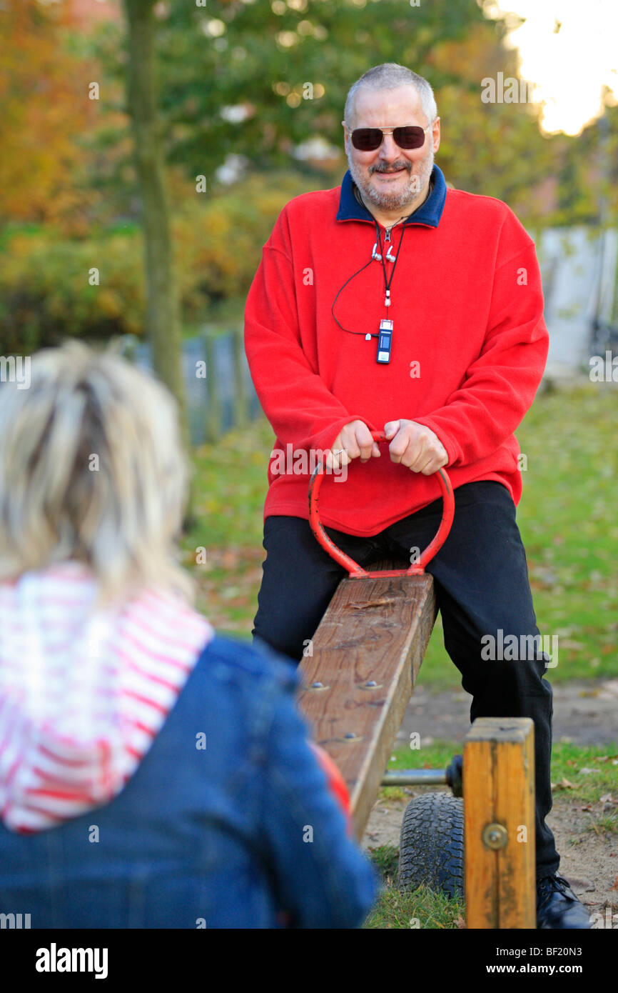 senior citizens playing on a playground together Stock Photo Alamy