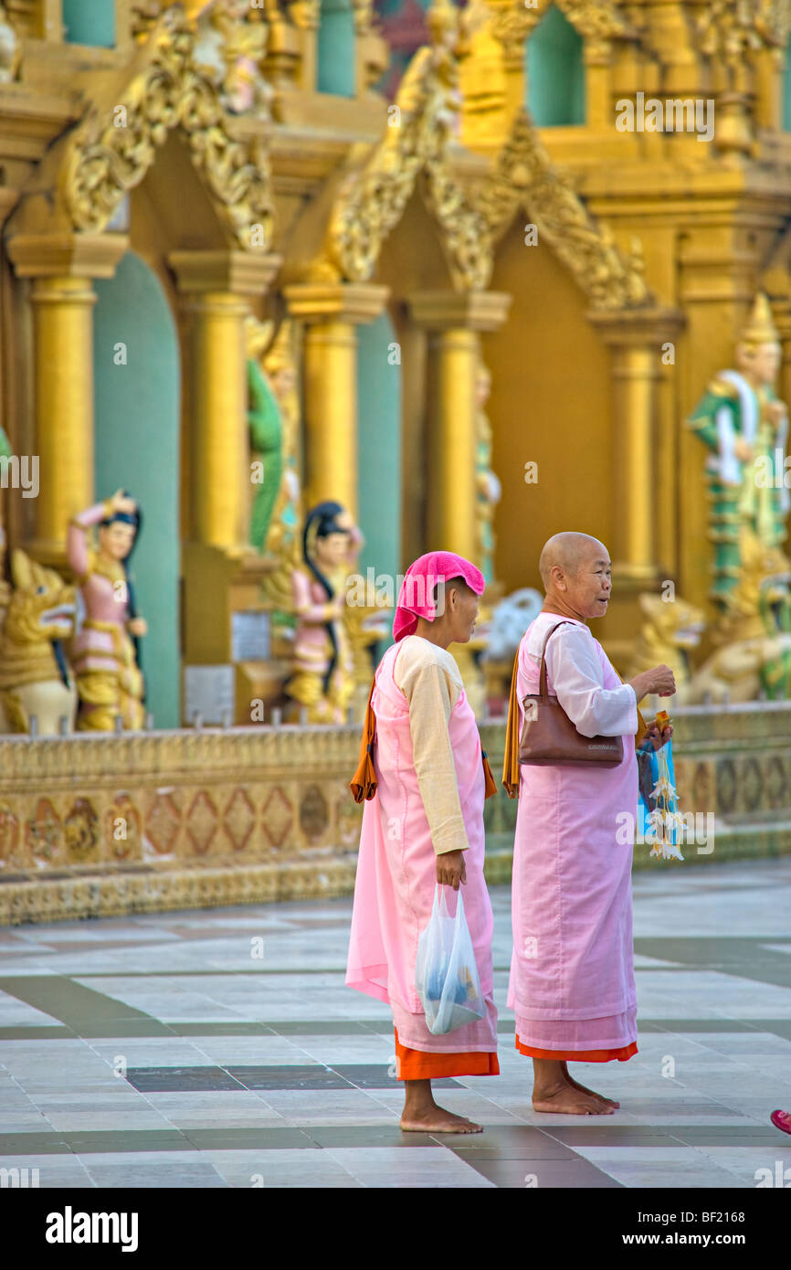 People praying at Shwedagon Paya, Yangoon, Myanmar. Stock Photo