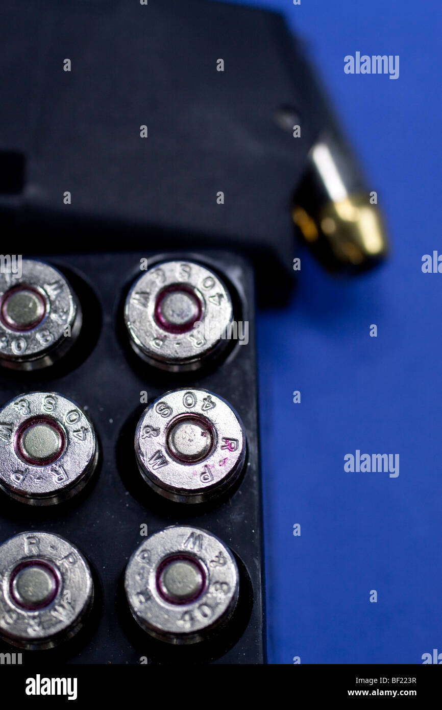 Ammunition and Glock .40 caliber high-capacity magazine. Stock Photo