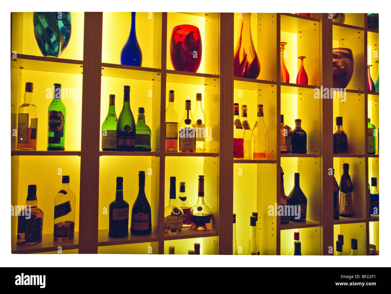 Backlit bottles in bar, Melbourne Australia Stock Photo