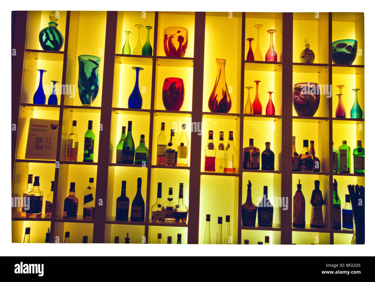 Backlit bottles in bar, Melbourne Australia Stock Photo
