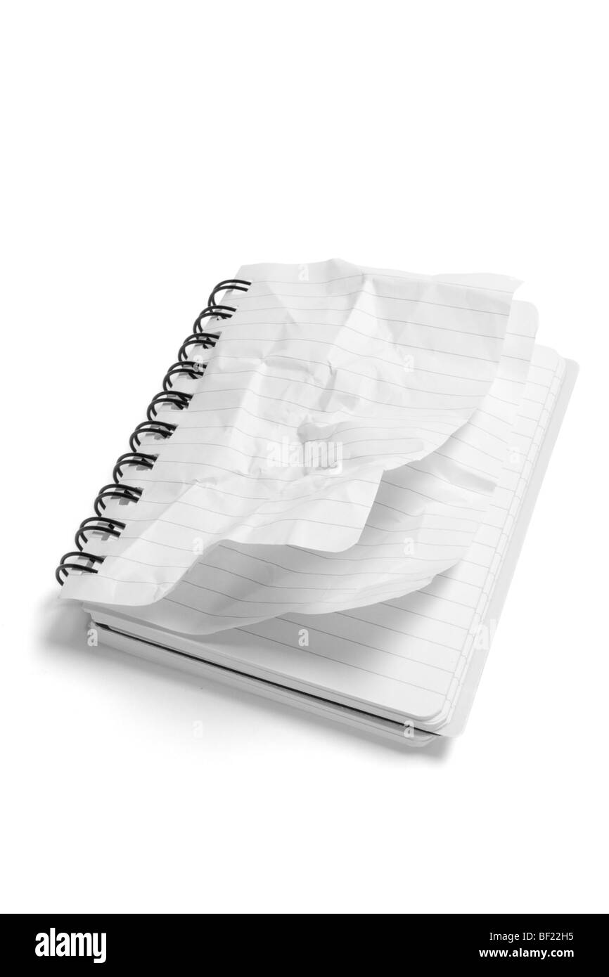 Notepad with Crumpled Pages Stock Photo