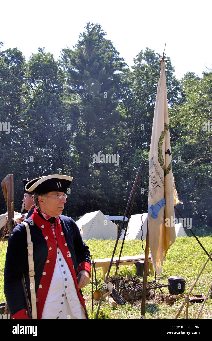 American Patriot in military tent camp - costumed American Revolutionary War (1770's) era re-enactment Stock Photo