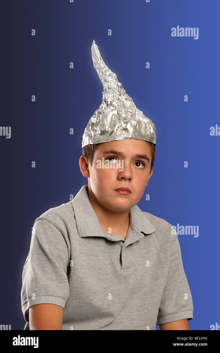 Boy wearing tin-foil hat. Stock Photo