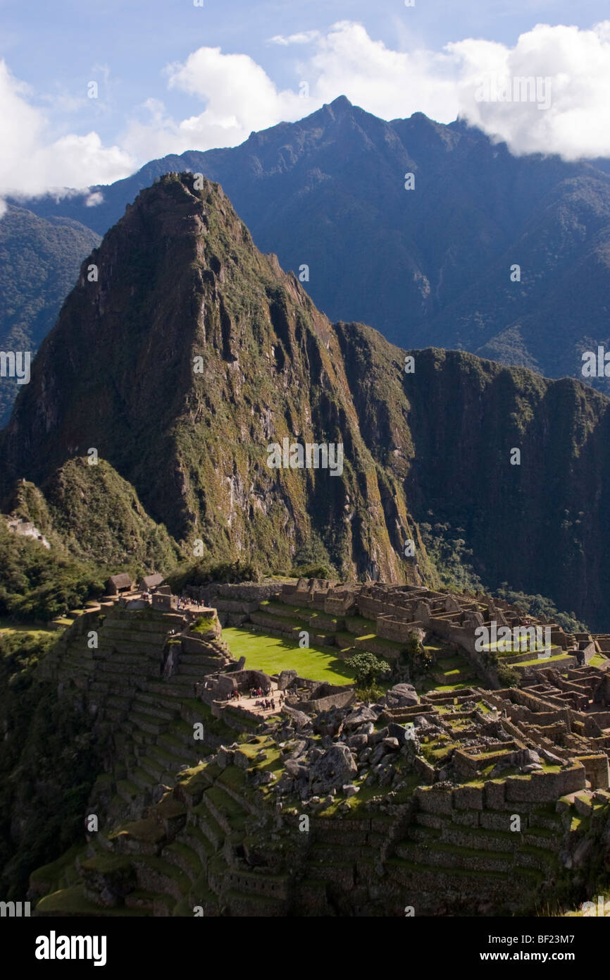 Ancient Inca ruins of Machu Picchu high in the Andes mountains in Peru ...