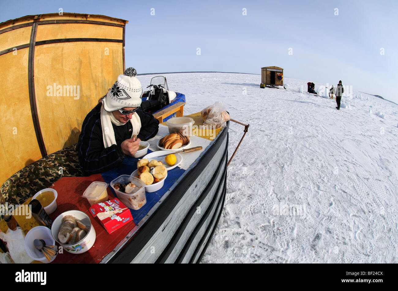 Lunch, pretzel on icecamp, White Sea, Russia Stock Photo
