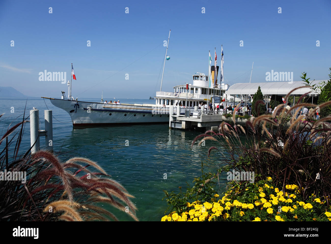 Excursion boat at jetty, Montreux, Canton of Vaud, Switzerland Stock Photo