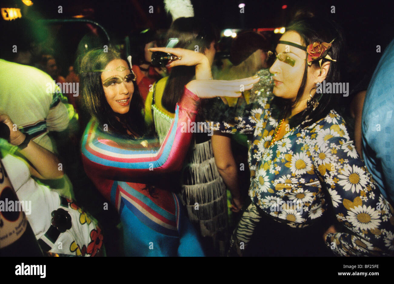 Two girls dancing eqyptian arabic style, seventies dress, Scandale Night Club London England Stock Photo