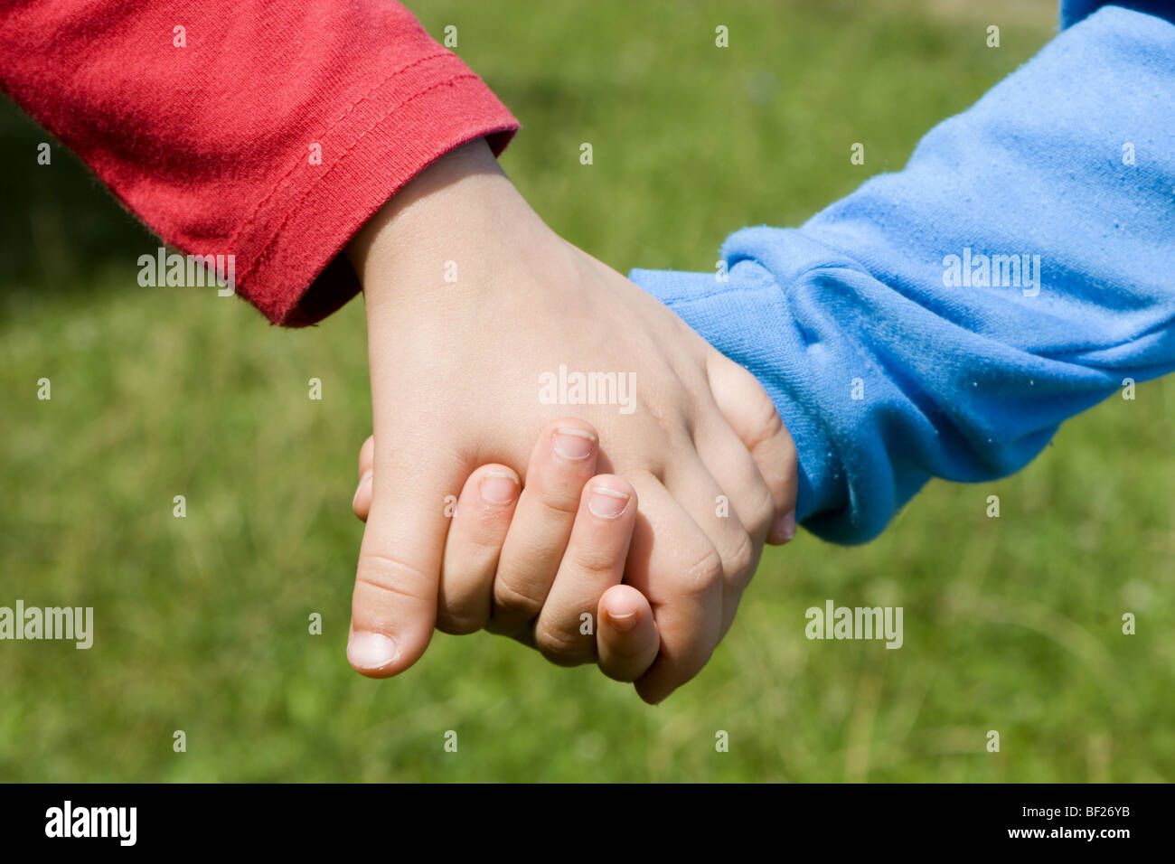 hands of little children by the play Stock Photo