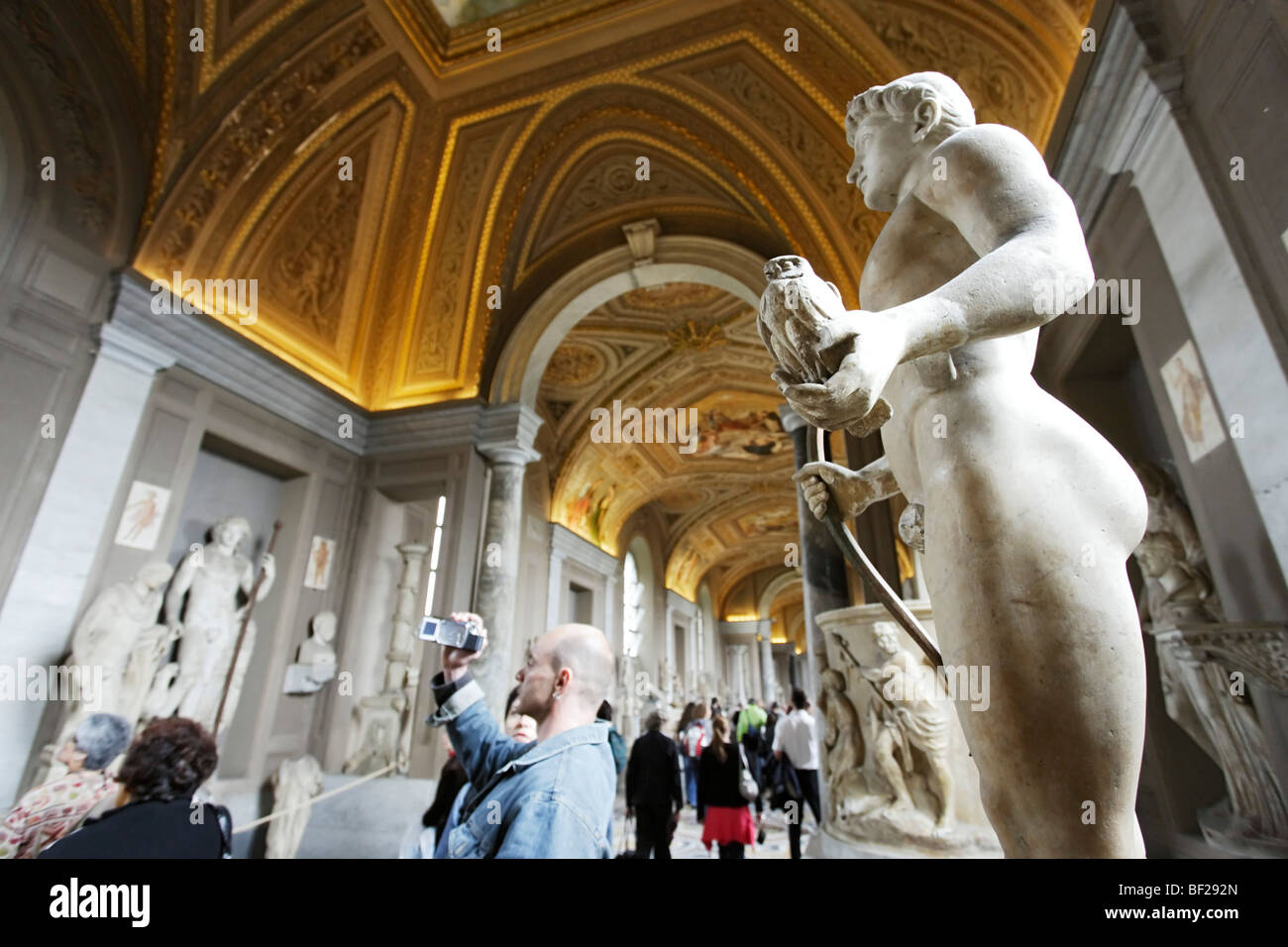 Tourists visiting sculptures, Vatican Museums, Vatican City, Rome, Italy Stock Photo Alamy