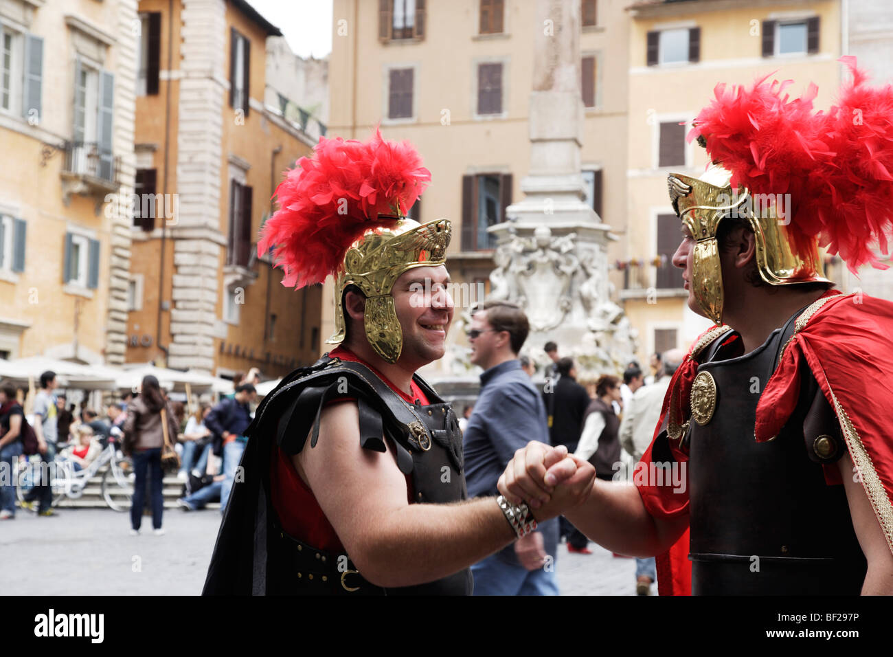 Two men wearing uniforms of Roman legionaries, Piazza del Rotonda, Rome, Italy Stock Photo