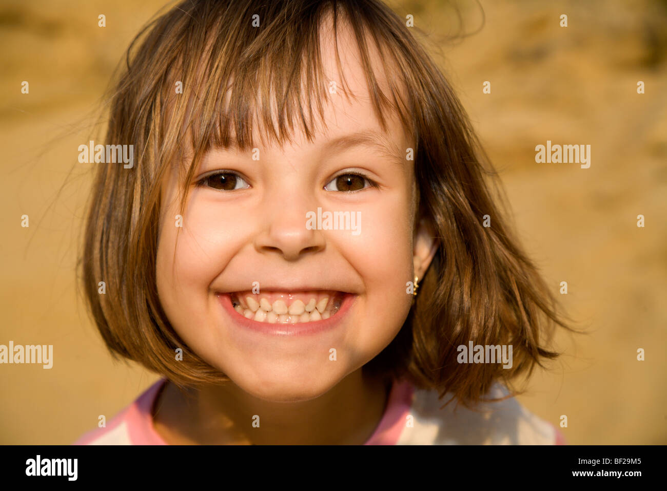 atractive smile of little girl Stock Photo