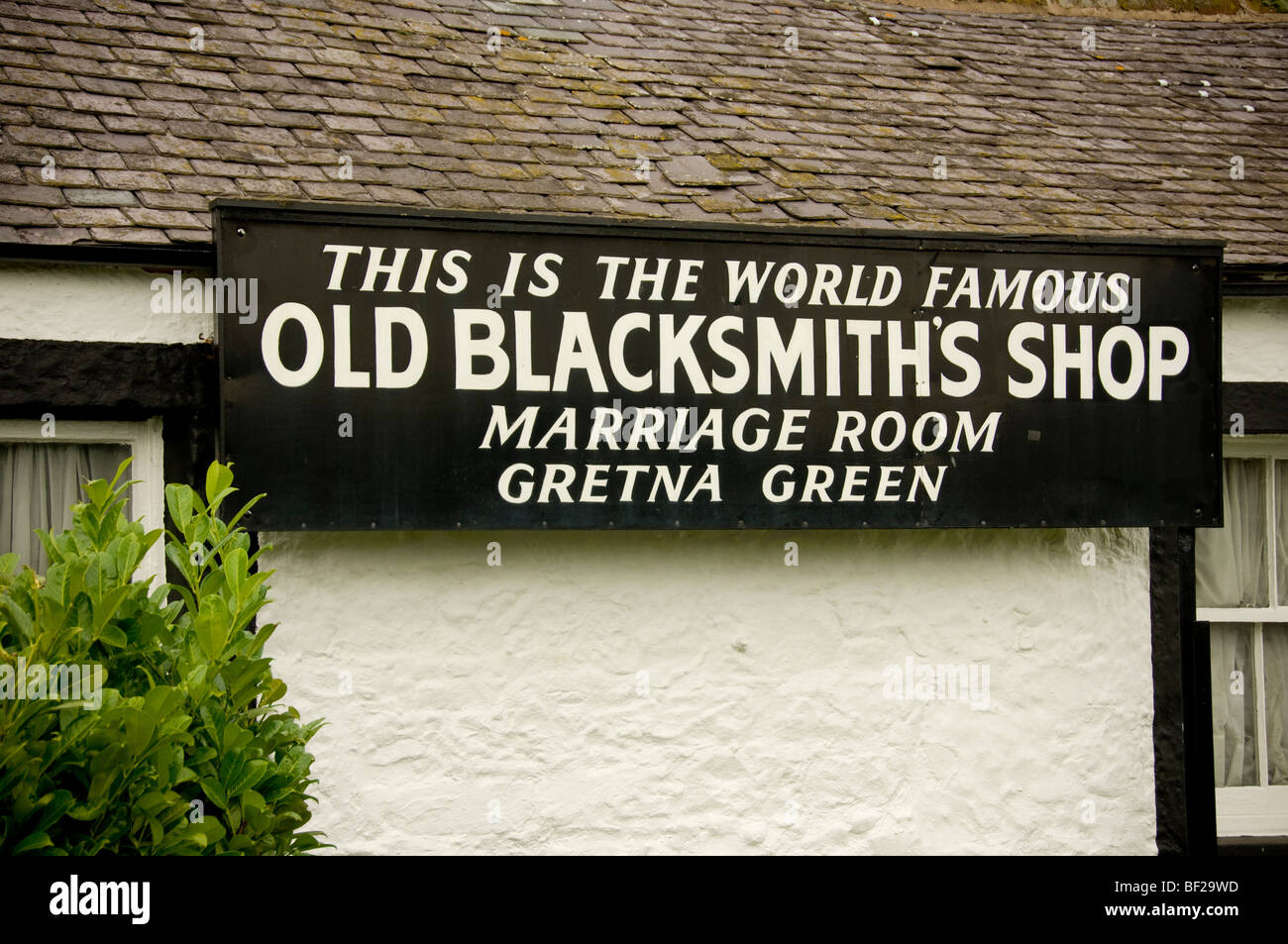 Closeup of an exterior sign for the Marriage room at the Old Blacksmith's Shop, Gretna Green, Scotland, UK Stock Photo