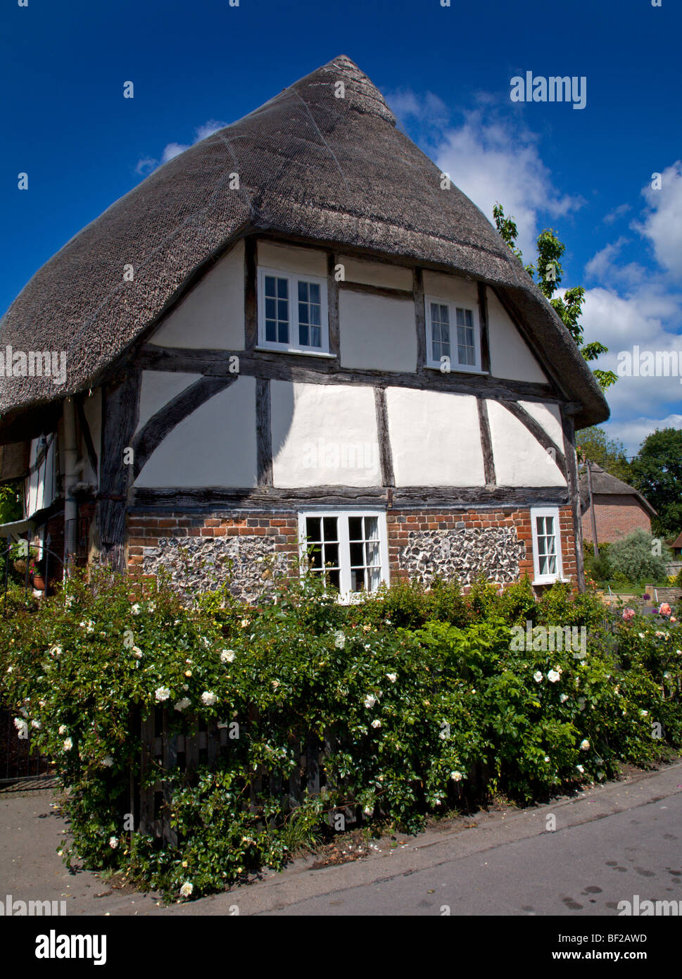 Thatched Cottage in Winterbourne, Wiltshire, England Stock Photo