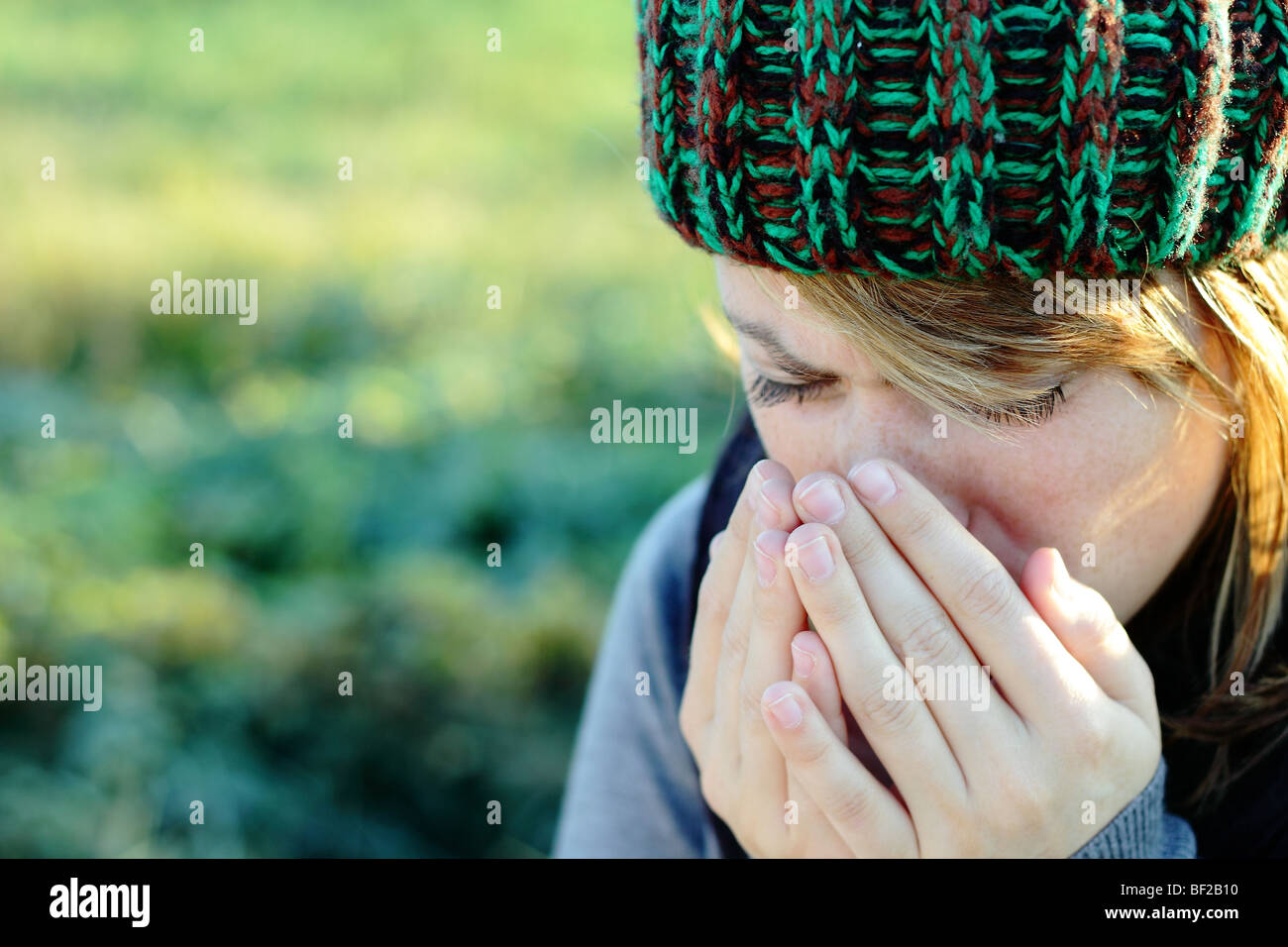 woman is getting cold Stock Photo
